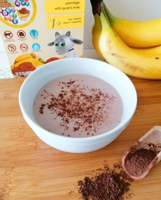 غذای کمکی(فرنی)غلات برنج و گندم با شیر بز +7ماه با طعم موز و کاکائوی ۲۲۵گرم گات تاینیGoat tiny